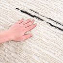 Riad Black Striped White Rug with Tassels Riad Black Striped White Rug with Tassels