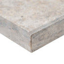 MSI-Silver-Travertine-Pool-Coping-12x24-Eased-Edge-LCOPTSIL1224HUFBR-EE-corner-close-up MSI-Silver-Travertine-Pool-Coping-12x24-Eased-Edge-LCOPTSIL1224HUFBR-EE-corner-close-up
