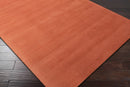 Brockton Solid Orange Wool Rug Brockton Solid Orange Wool Rug