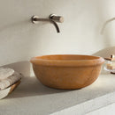 gobek natural golden sienna natural stone vessel sink honed and filled SKU KMRC166DI Size (D)16" (H)6" installed on bathroom as mounting type is countertop gobek natural golden sienna natural stone vessel sink honed and filled SKU KMRC166DI Size (D)16" (H)6" installed on bathroom as mounting type is countertop