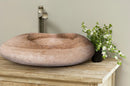 Noce Brown Travertine Natural Stone Kayak Sink SKU-NTRSTC21 Size (W)23" (L)16" (H)6" installed in room on the counter Noce Brown Travertine Natural Stone Kayak Sink SKU-NTRSTC21 Size (W)23" (L)16" (H)6" installed in room on the counter