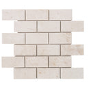 Shell Stone Limestone 2"x4" Brick Honed on 12" x 12" Mesh Mosaic Tile Product shot on white background Shell Stone Limestone 2"x4" Brick Honed on 12" x 12" Mesh Mosaic Tile Product shot on white background
