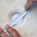 Beige travertine round drop-in sink NTRSTC03 D16 H6 drain hole view Beige travertine round drop-in sink NTRSTC03 D16 H6 drain hole view