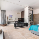 Classic Light Travertine Honed Floor and Wall Tile SKU-CLT24x48HF installed view Classic Light Travertine Honed Floor and Wall Tile SKU-CLT24x48HF installed view