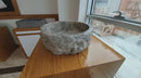 silver travertine rustic stone vessel sink polished interior hand chiseled exterior SKU NTRVS13 Size (D)16" (H)6" video silver travertine rustic stone vessel sink polished interior hand chiseled exterior SKU NTRVS13 Size (D)16" (H)6" video