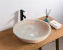 natural stone beige travertine vessel sink honed and filled SKU NTRSTC02 size  (D)18" (H)6" installed in bathroom natural stone beige travertine vessel sink honed and filled SKU NTRSTC02 size  (D)18" (H)6" installed in bathroom