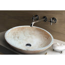 troia light beige travertine natural stone oval vessel sink surface honed filled size (W)16" (L)21" (H)6" (52cmx41cm)-SKU-NTRSTC06 installed on bathroom. troia light beige travertine natural stone oval vessel sink surface honed filled size (W)16" (L)21" (H)6" (52cmx41cm)-SKU-NTRSTC06 installed on bathroom.