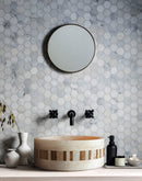 troia light travertine natural stone cylinder sink honed and filled matte SKU NTRVS39 size (D)16" (H)6" installed in bathroom  troia light travertine natural stone cylinder sink honed and filled matte SKU NTRVS39 size (D)16" (H)6" installed in bathroom