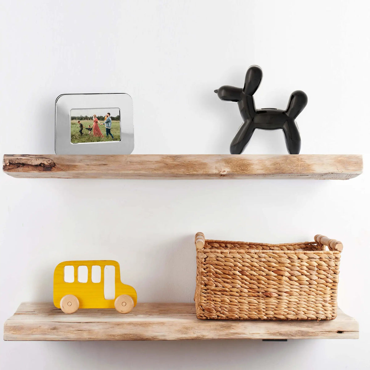 Balloon Dog Bank Black, installed in a room