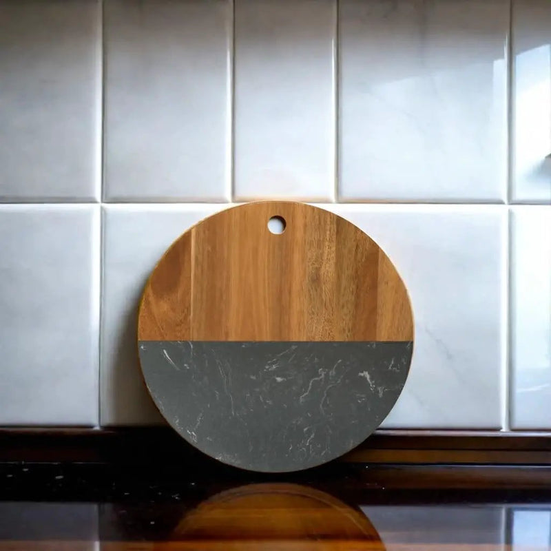 Black Marble and Acacia Wood Round Board - 12", installed in a room