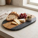 Black Marble and Acacia Wood Oval Board by creativegiftsdirect