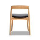 Raven - Stacking Sculpted Oak Dining Chair - Warm Natural Brown / Black by HouseOfZazla