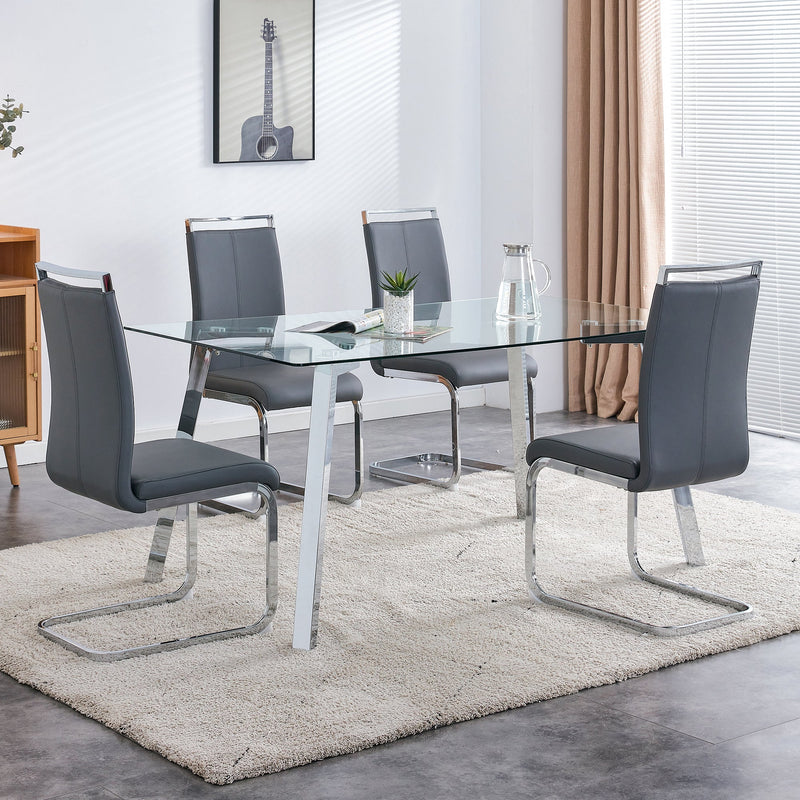 A modern minimalist rectangular glass dining table with tempered glass tabletop and silver metal legs, suitable for kitchens, restaurants, and living rooms,63"x35.4"x30"