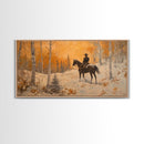 Cowboy riding horse through deep snow in a winter storm, Framed Canvas Print, dynamic winter wall art, rustic western home decor