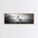 Coastal Pelican, Ocean Rock, Tranquil Wildlife Scene, Framed Canvas Print, Beach House Wall Art, Seaside Nature Decor, Moody Tones
