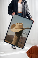 Cowboy Hat on Fence Post