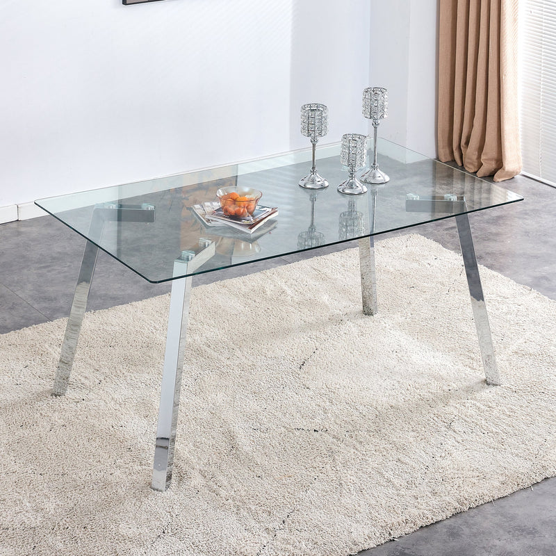 A modern minimalist rectangular glass dining table with tempered glass tabletop and silver metal legs, suitable for kitchens, restaurants, and living rooms,63"x35.4"x30"