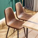 A set of 4 modern medieval style restaurant cushioned side chairs, equipped with soft cushions and black metal legs, suitable for kitchens, lounges, and farmhouses.