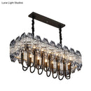 GobekUsa 14-Head Crystal Flute Hanging Ceiling Light in Swirled Black - Sleek Island Lighting Idea