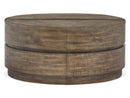 Baisden - Round Lift Top Cocktail Table With Casters - Tobacco