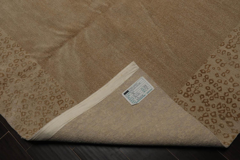 6'1" x 9' Lapchi Hand Knotted Wool & Silk Animal Print Tibetan Area Rug Beige