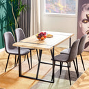 A set of 4 modern medieval style restaurant cushioned side chairs, equipped with soft cushions and black metal legs, suitable for kitchens, lounges, and farmhouses.
