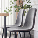 A set of 4 modern medieval style restaurant cushioned side chairs, equipped with soft cushions and black metal legs, suitable for kitchens, lounges, and farmhouses.