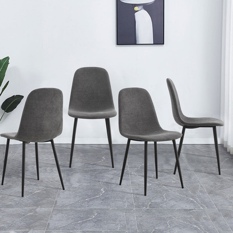 A set of 4 modern medieval style restaurant cushioned side chairs, equipped with soft cushions and black metal legs, suitable for kitchens, lounges, and farmhouses.
