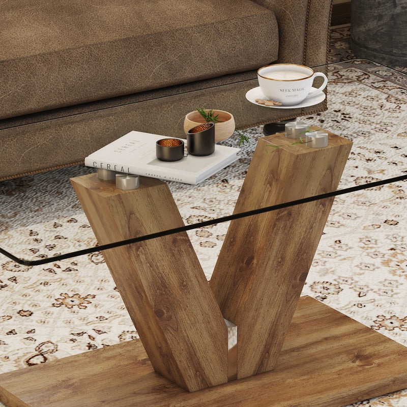 A modern minimalist style coffee table. Transparent tempered glass tabletop with wooden MDF columns. Suitable for living room and dining room. CT-V