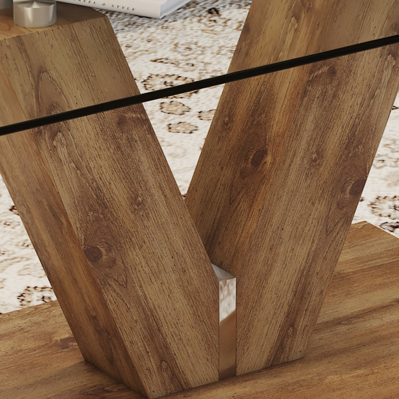 A modern minimalist style coffee table. Transparent tempered glass tabletop with wooden MDF columns. Suitable for living room and dining room. CT-V