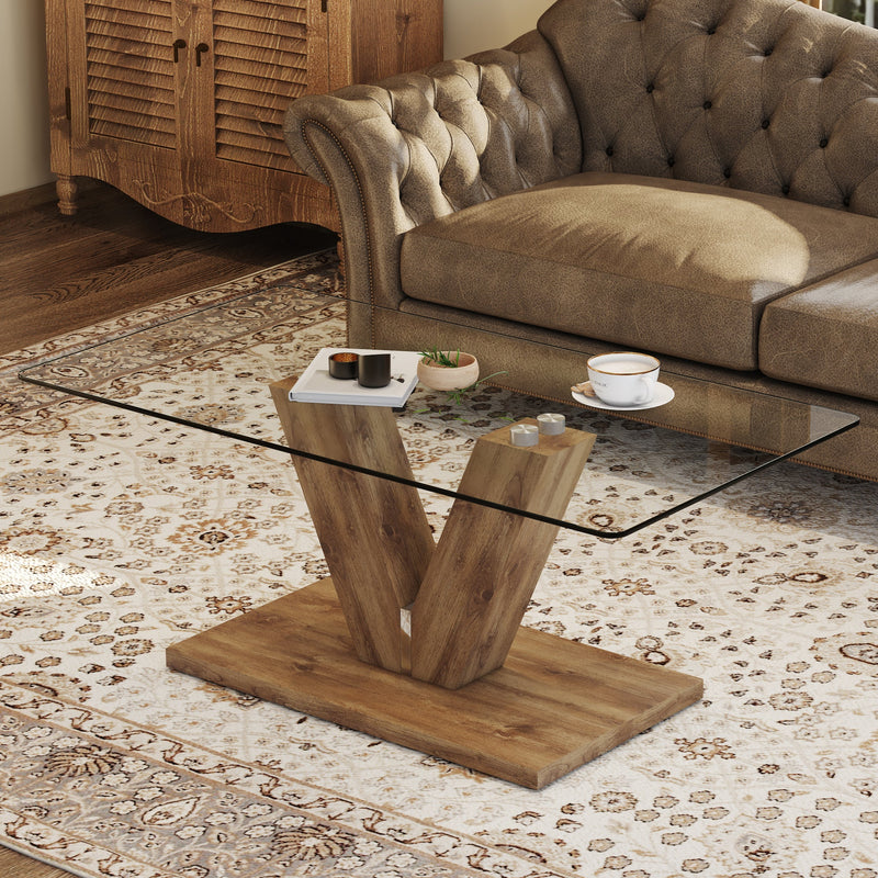 A modern minimalist style coffee table. Transparent tempered glass tabletop with wooden MDF columns. Suitable for living room and dining room. CT-V