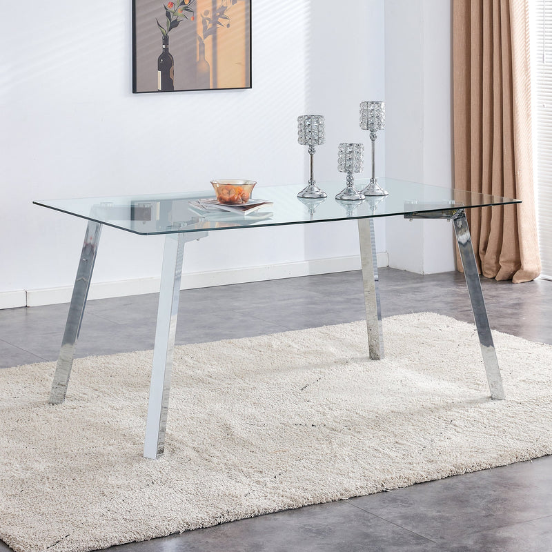 A modern minimalist rectangular glass dining table with tempered glass tabletop and silver metal legs, suitable for kitchens, restaurants, and living rooms,63"x35.4"x30"
