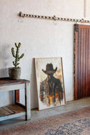 Lone Cowboy in Shadow and Flame