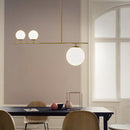 GobekUsa Minimalistic Brass Ball Pendant Light: Opal Glass Island Lighting for Dining Room (3-Light)