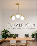 GobekUsa Modern Gold Metal Pendant Lighting with Glass Spherical Shade - Ideal for Dining Table or Island Ceiling