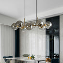 GobekUsa Mid-Century Gold Island Pendant Light - 8 Lights, Spherical Glass, Perfect for Dining Table