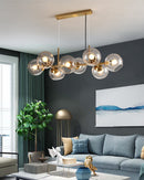 GobekUsa Mid-Century Gold Island Pendant Light - 8 Lights, Spherical Glass, Perfect for Dining Table