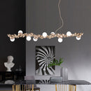GobekUsa Modern Gold Metal Pendant Lighting with Glass Spherical Shade - Ideal for Dining Table or Island Ceiling