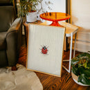 Tiny Ladybug on Paper