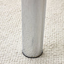 A modern minimalist style glass dining table. Transparent tempered glass tabletop with a thickness of 0.3 feet and silver metal legs. Suitable for restaurants and living rooms. 63 "x 35.4" x 30"