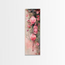 Lantern Glow Canvas Print, whimsical Moroccan wall art with light pink tones and floral accents, tall skinny vertical wall art piece.