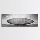 Surfboard Alone, Beach Sand, Cloudy Sky, Framed Canvas Print, minimalist surf art, coastal man cave decor, surf lover gift idea