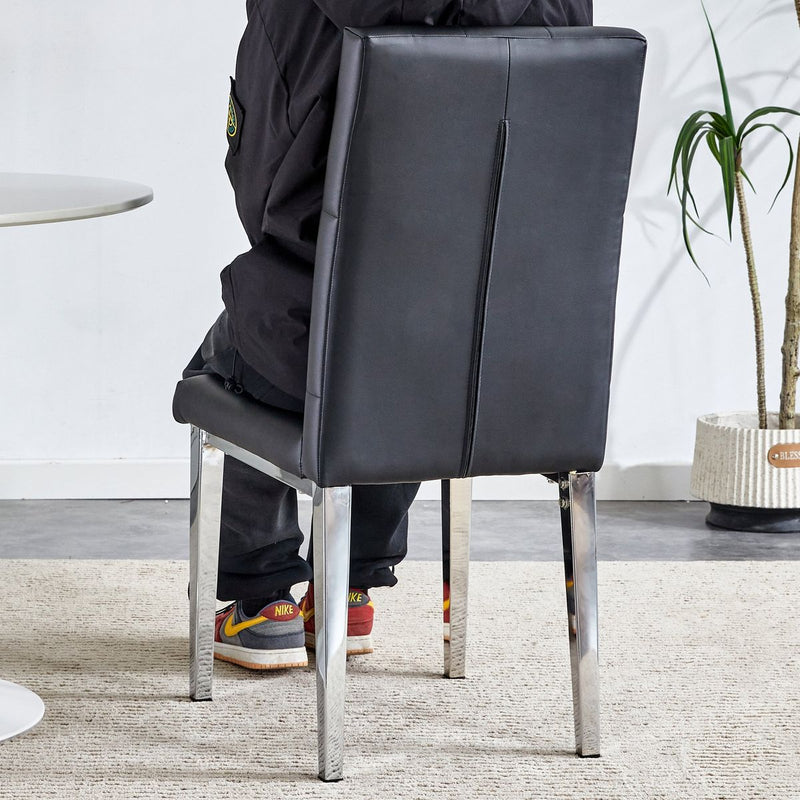 8 piece set of black armless dining chairs brings a touch of elegance and mystery to the dining area with its deep black tone,The grid and buckle design of the back add a vintage yet fashionable touch