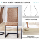 A modern and practical circular dining table. Made of MDF tabletop and wooden MDF table legs. 4-piece technology cloth high backrest cushion side chair, C-shaped tube black metal legs.