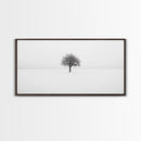 Footprints In the Snow Lead To a Lone Dead Tree - Framed Canvas Print - Ready To Hang Art - Moody Wall Art - Black and White Photography Print