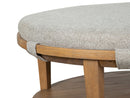 Lindon - Round Cocktail Table With Gray Upholstered Top & Casters - Belgian Wheat