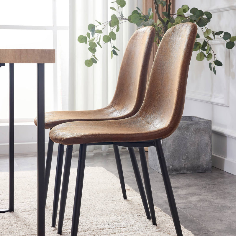 A set of 4 modern medieval style restaurant cushioned side chairs, equipped with soft cushions and black metal legs, suitable for kitchens, lounges, and farmhouses.