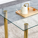 A modern minimalist style glass dining table. Transparent tempered glass tabletop with a thickness of 0.3 feet and golden metal legs. Suitable for restaurants and living rooms. 51"x31.4"x29.5"
