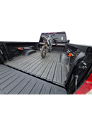 Truck bed tie down system