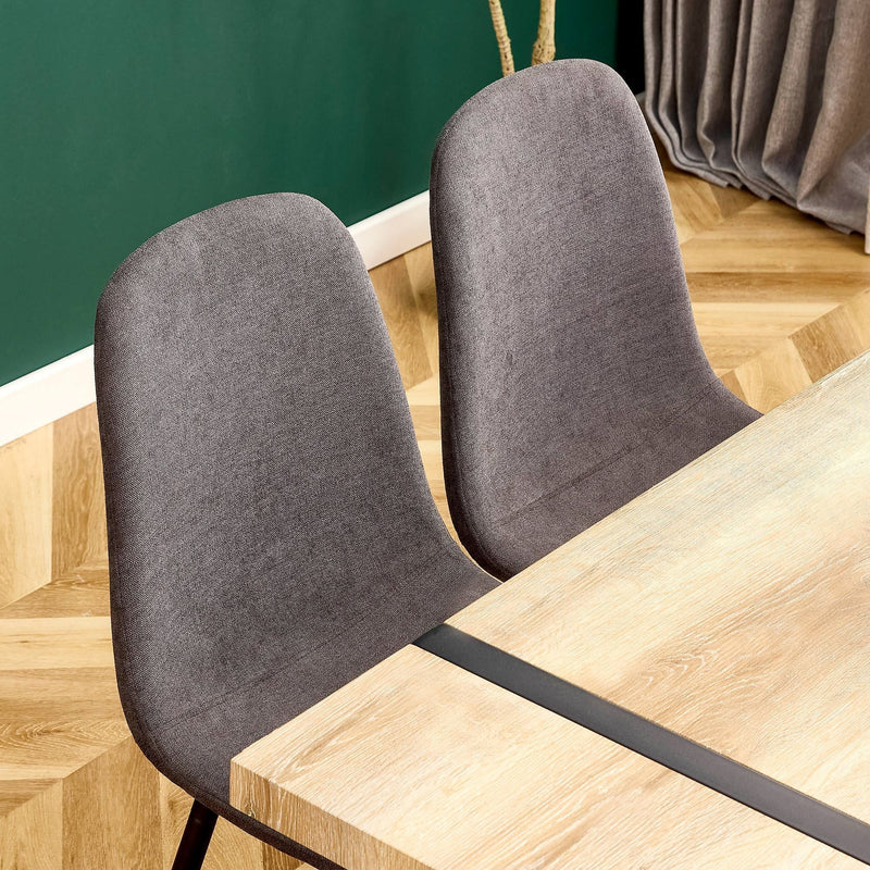 A set of 6 modern medieval style restaurant cushioned side chairs, equipped with soft cushions and black metal legs, suitable for kitchens, lounges, and farmhouses.